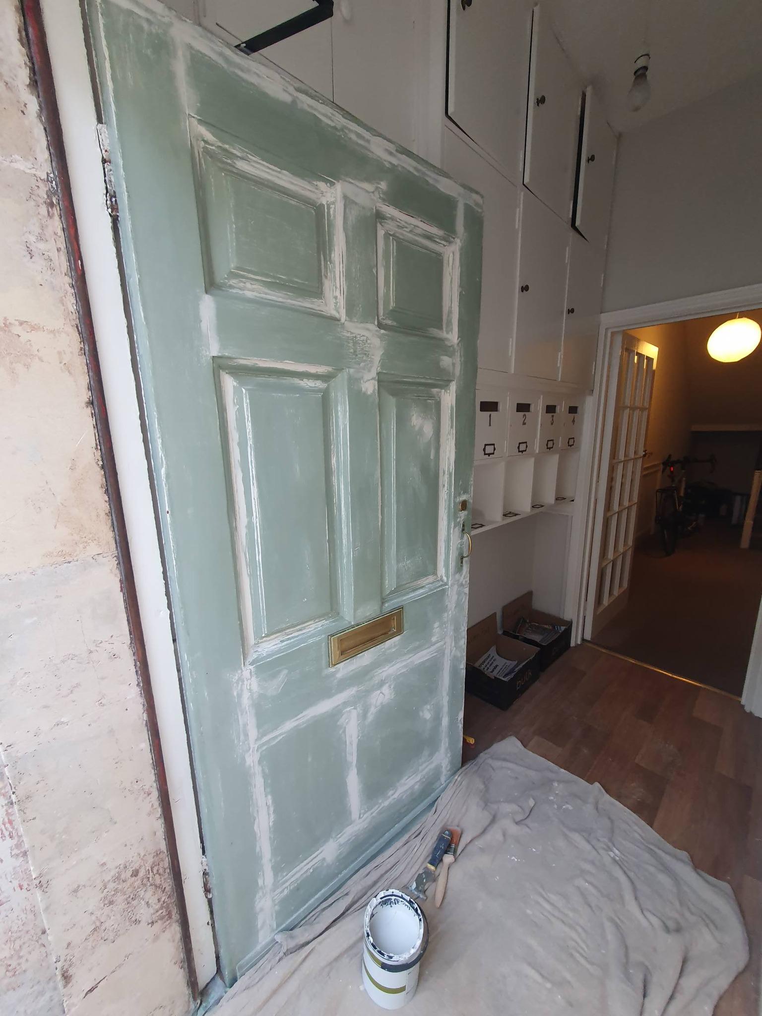 Georgian front door being primed and prepared with filler before repainting