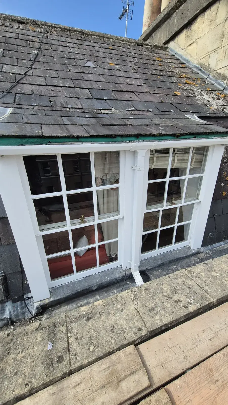 Completed dormer with both sash windows restored and repainted white, Bath