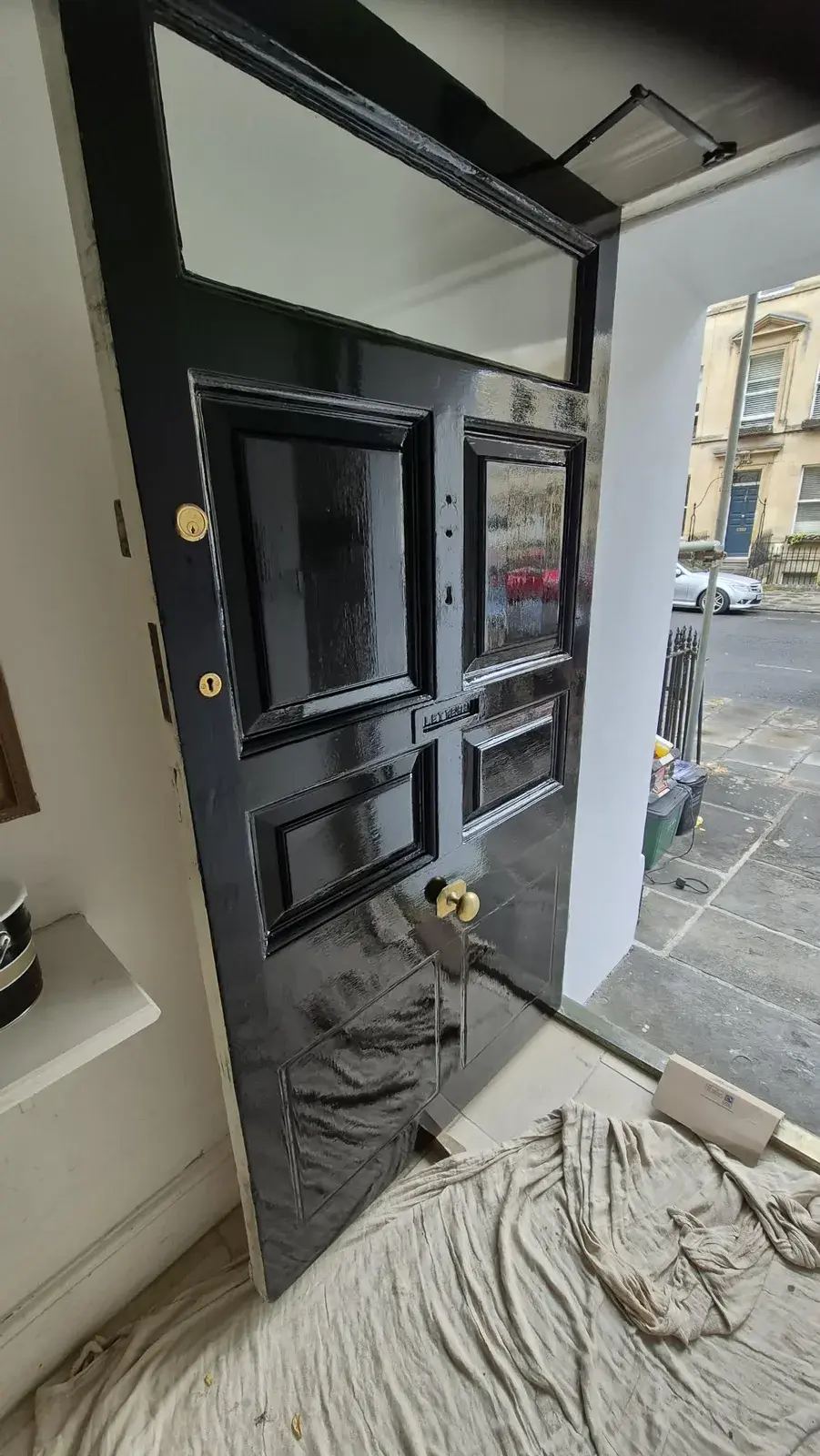 Panelled front door finished in black high gloss, Bath