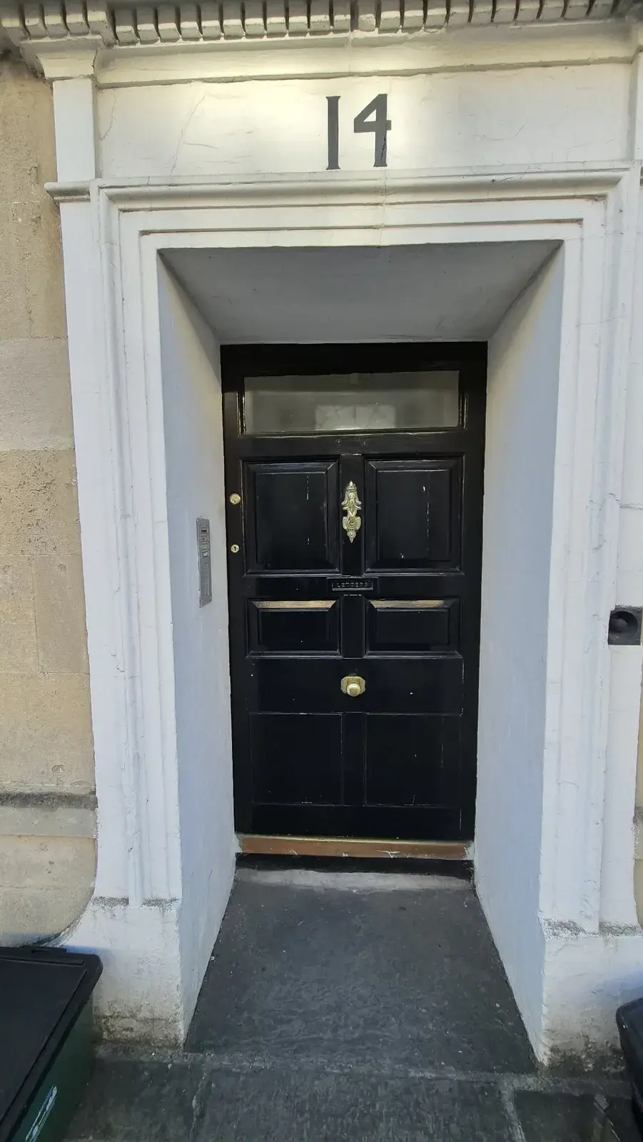 Georgian panelled front door with tired paintwork before redecoration, Bath