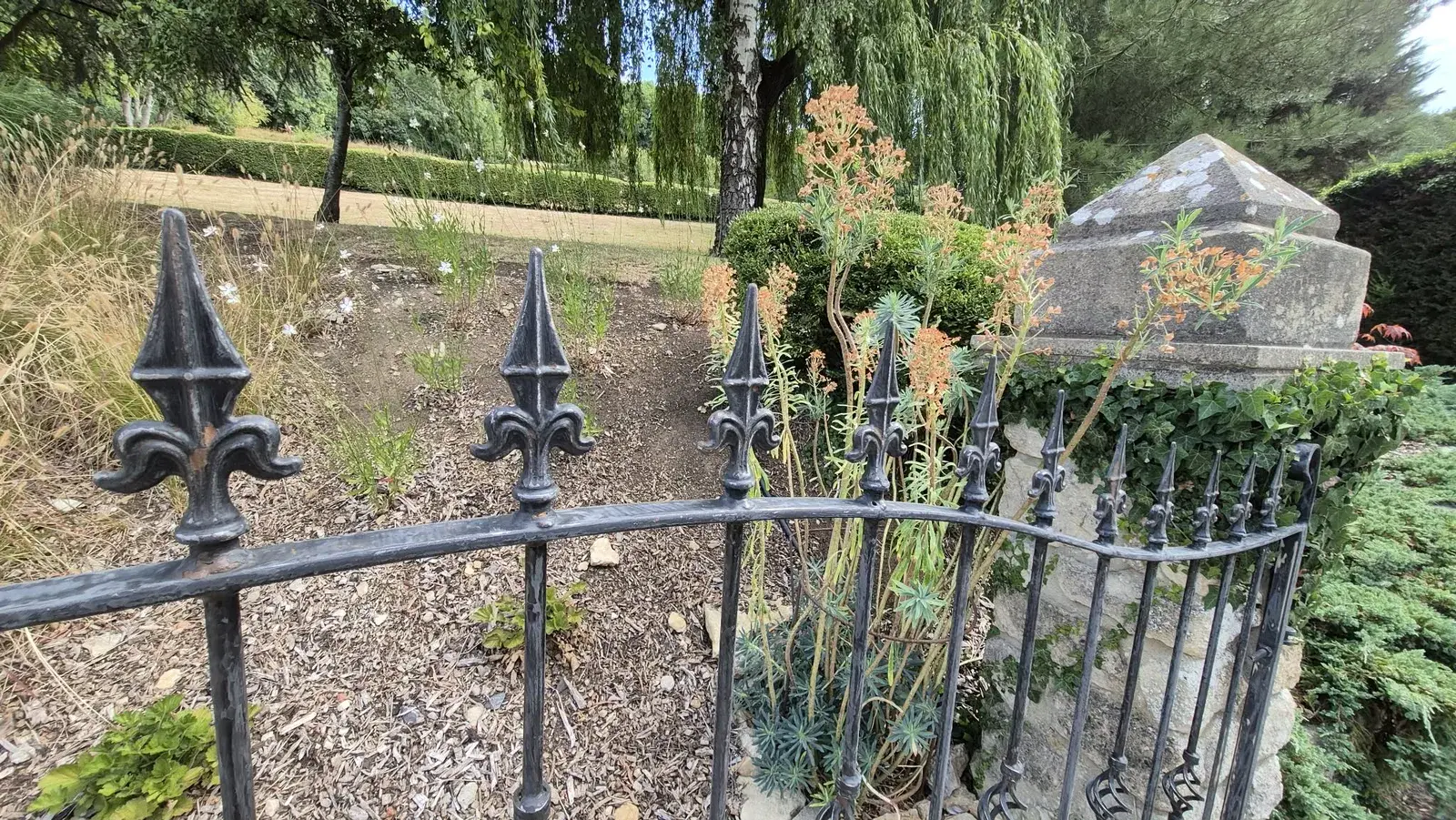 Wrought iron railings sanded back to bare metal before priming, Warleigh
