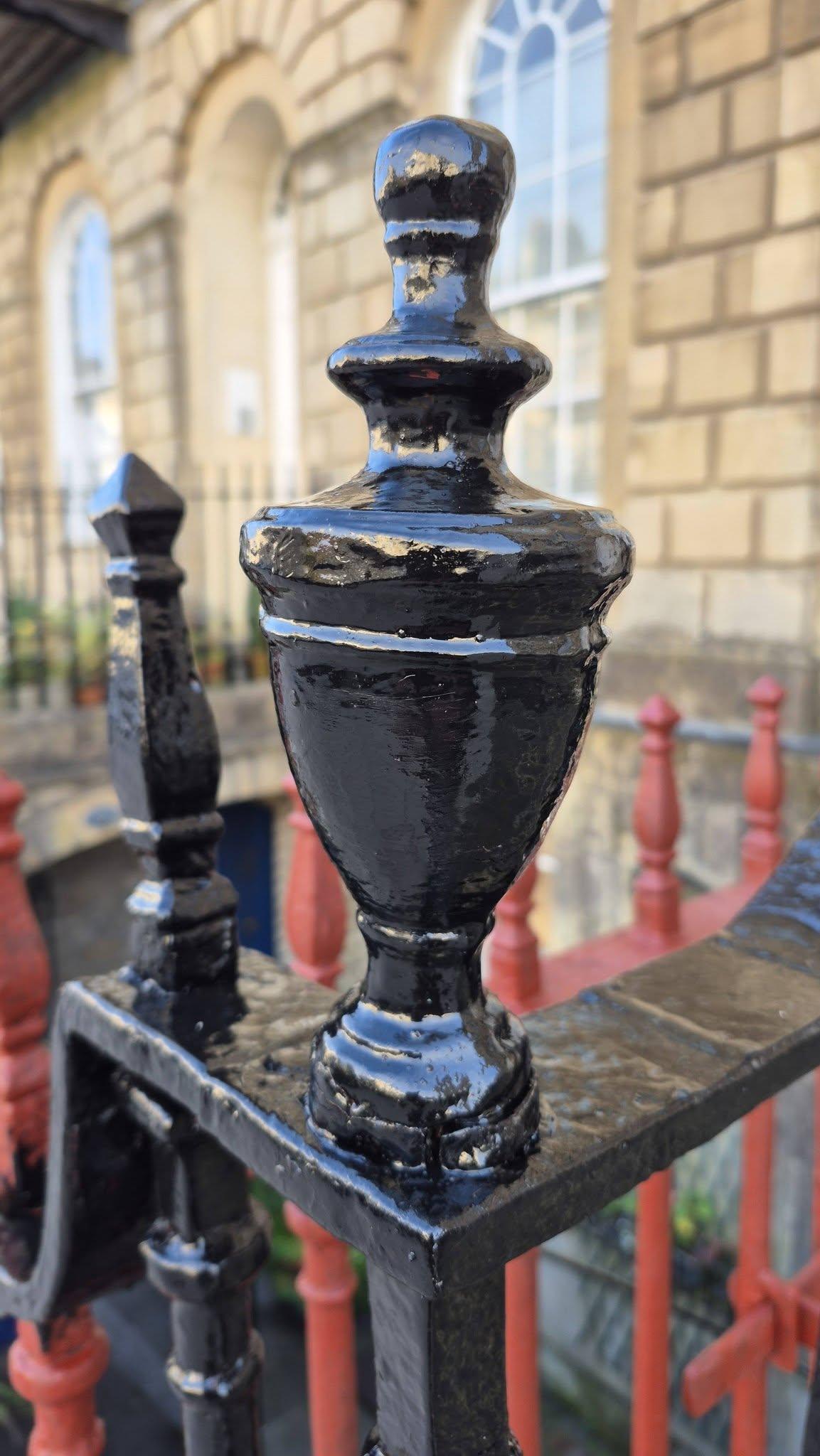 Restored railing – glossy black finial, Bath